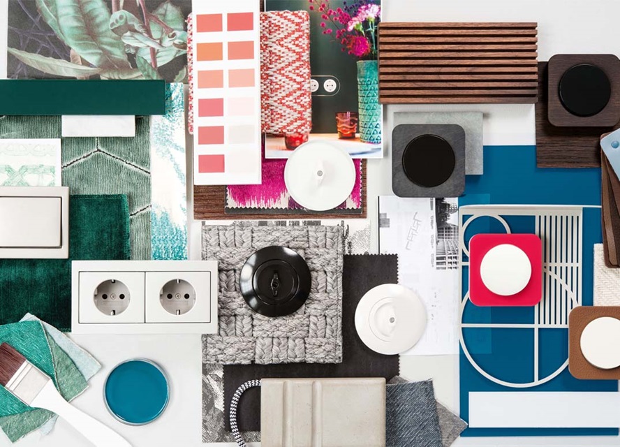 Interior design mood board with fabric swatches, paint samples, and electrical outlets and switches