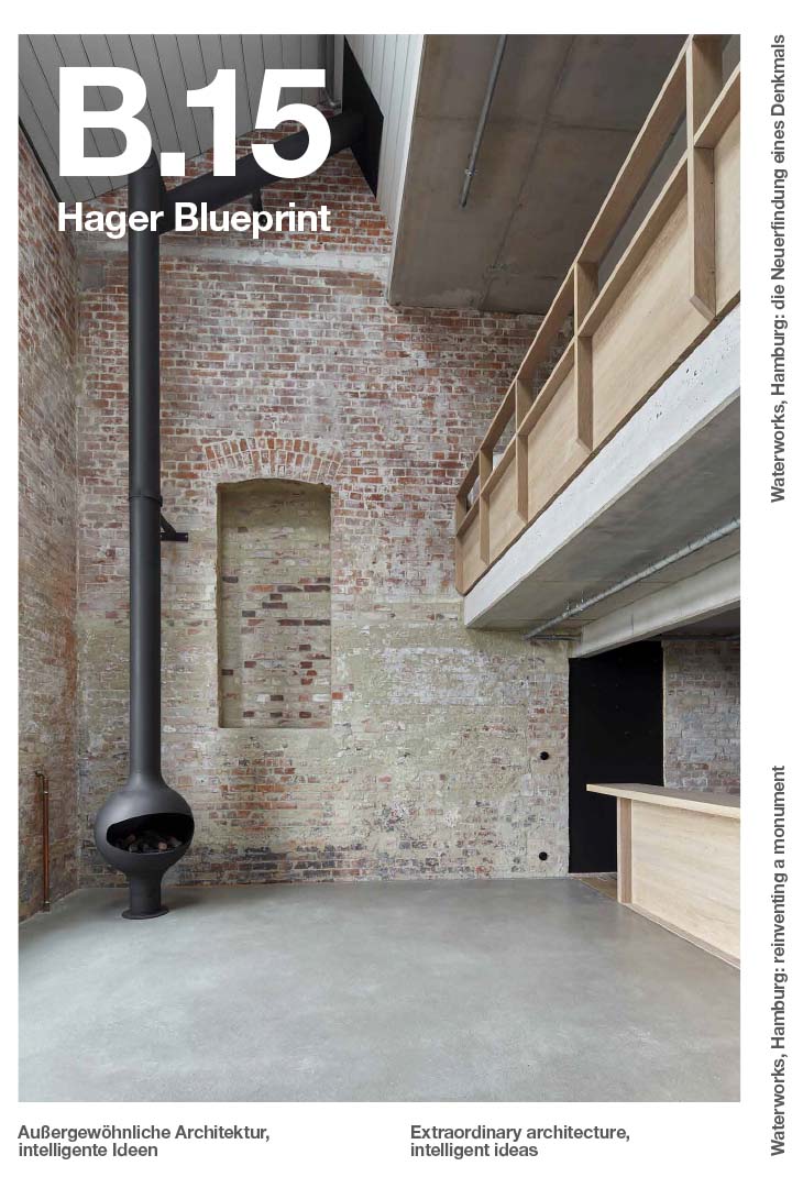 Modern architectural interior with exposed brick walls, hanging stovepipe, and wooden stairs leading to a loft space, featuring minimalist design elements